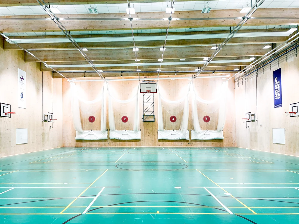 The Wilf Slack Cricket Centre at William Perkin School, with four practice lanes and retained multi-sport court markings